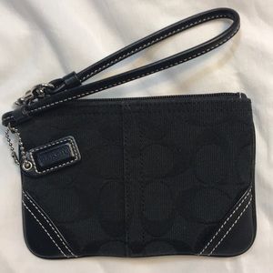 Mini black Coach wristlet